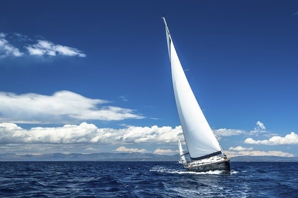 A sailboat out in the ocean 